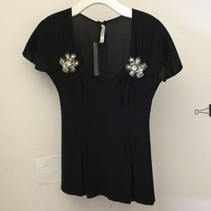 Prada blouse with broach detail